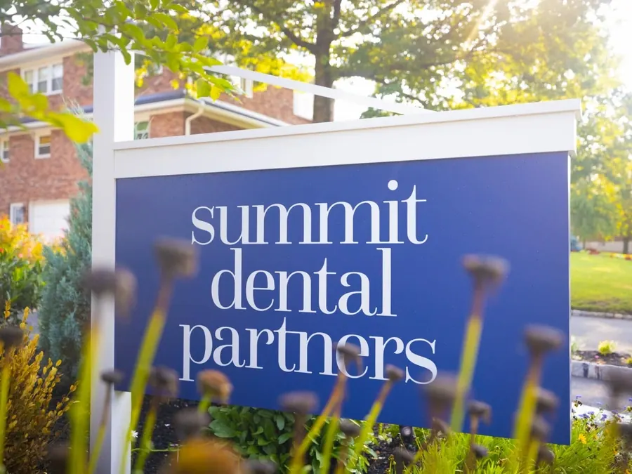 The Summit Dental Partners sign in the front garden on Springfield Avenue.